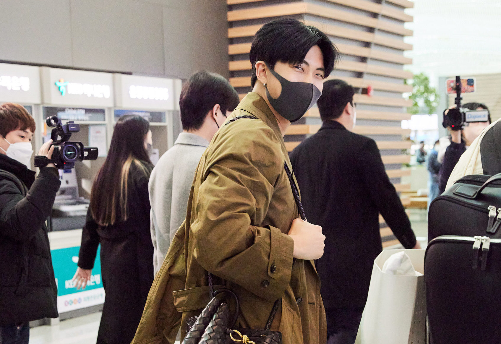 RM is seen wearing Bottega Veneta at the Incheon airport in Seoul