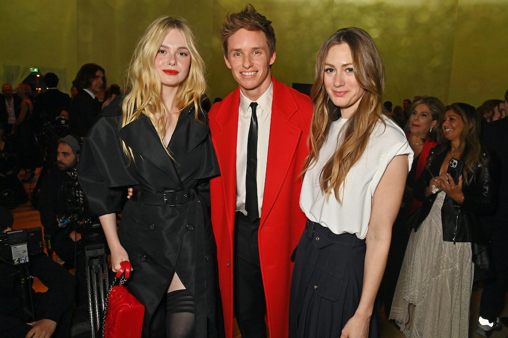 (L to R) Elle Fanning, Eddie Redmayne and Hannah Redmayne