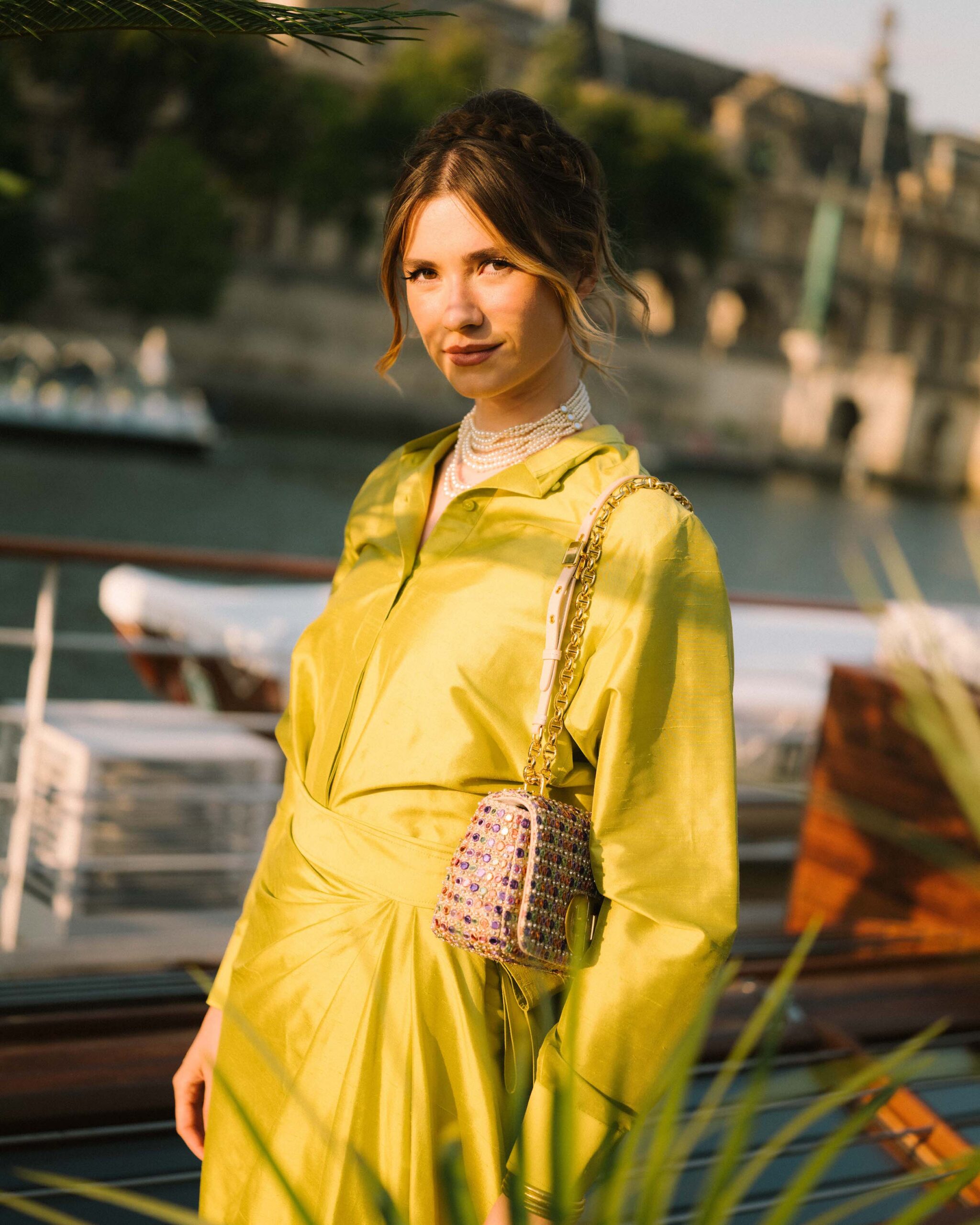 Zita d'Hauteville in Dior Pre Fall 2023 Zita d'Hauteville chose a vibrant yellow silk shirt and skirt from the Dior Pre Fall 2023 collection. She accessorized with a Dior bag and necklace.