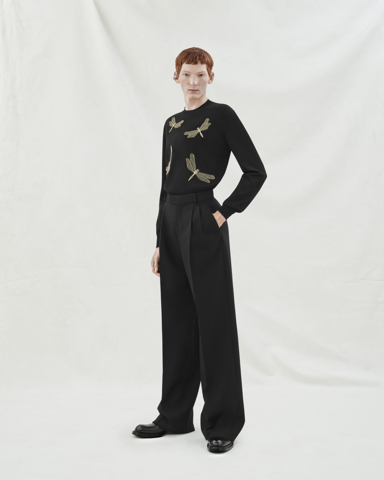 Look 24: Black merino wool jumper highlighted with jewelled dragonfly embroidery