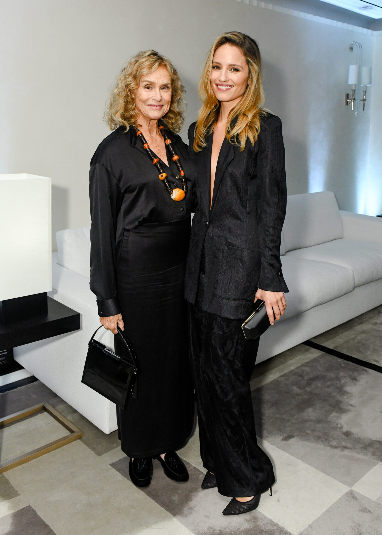 Dianna Agron and Lauren Hutton radiate timeless elegance as they celebrate the reopening of Giorgio Armani Boutique at Bergdorf Goodman.
