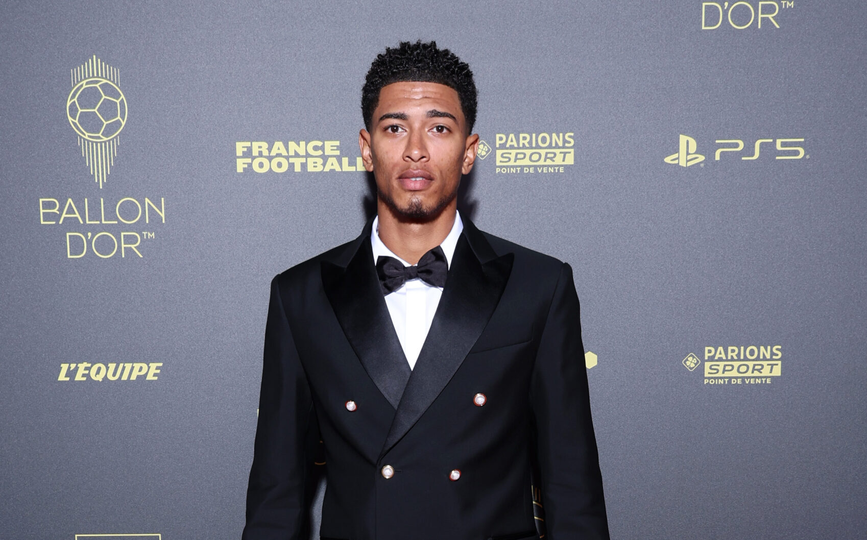 Jude Bellingham, epitomizing elegance in a custom Louis Vuitton double-breasted suit, graces the 2023 Ballon d’Or® ceremony. (Photo by Pascal Le Segretain/Getty Images)