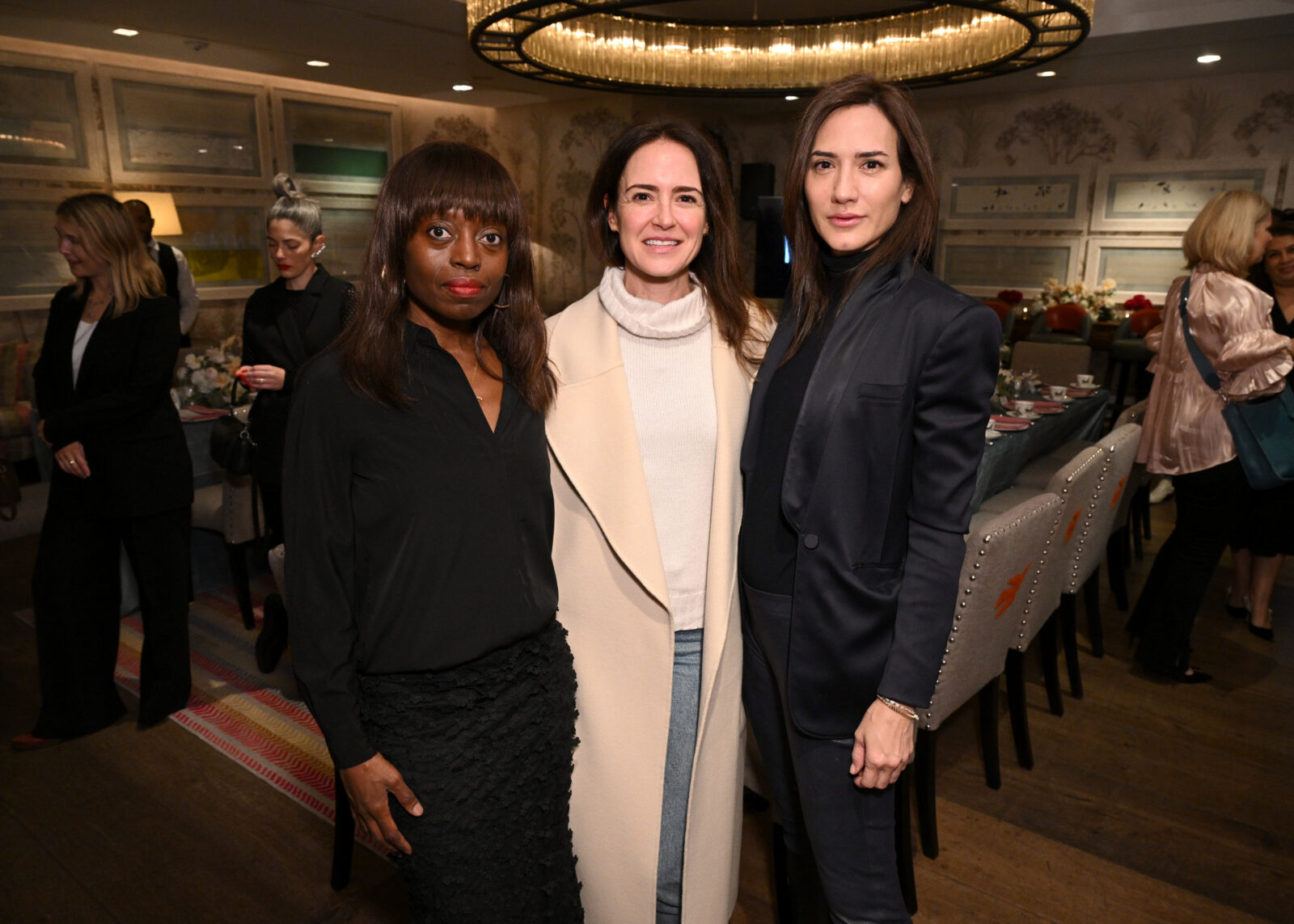 Dee Poku, Ariane Goldman, and Zani Gugelman shine at the NYAD Breakfast and Conversation event, held at New York City's Crosby Street Hotel on November 02, 2023. (Photo by Bryan Bedder/Getty Images for Netflix)