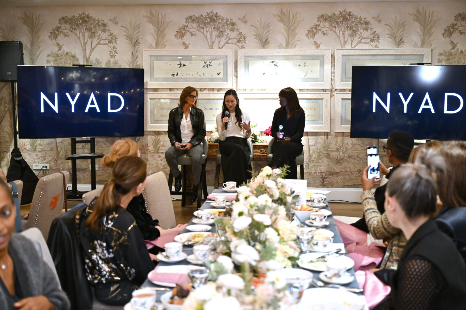 Bonnie Stoll, Elizabeth Chai Vasarhelyi, and Dee Poku engage in a spirited discussion at the NYAD Breakfast and Conversation event held at the Crosby Street Hotel, New York City, on November 02, 2023. (Photo by Bryan Bedder/Getty Images for Netflix)