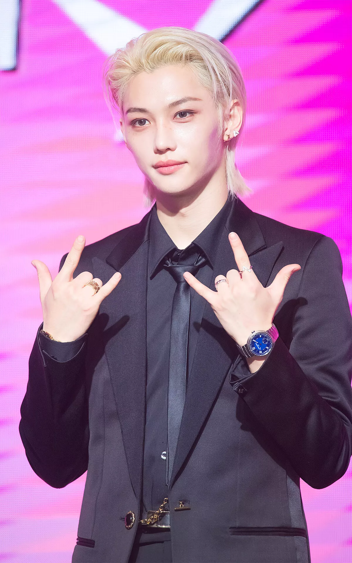 &quot;Felix of Stray Kids exudes charm in a Louis Vuitton black tuxedo and accessorizes with the brand’s signature fine jewelry, making a bold fashion statement at the '樂-STAR' EP press conference.&quot;