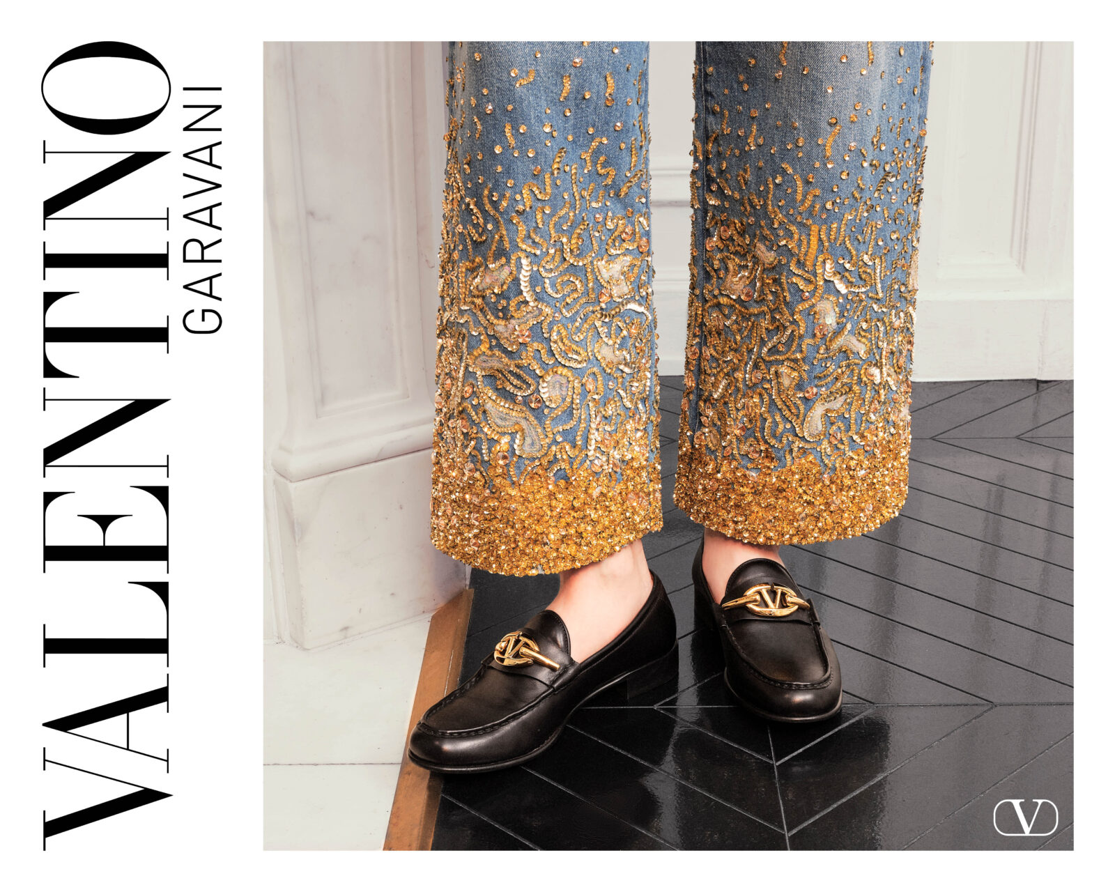 Golden Ambition: Step into the holiday season with Valentino Garavani, where ornate embellishments meet timeless denim elegance, crafting a narrative of luxurious festivity.