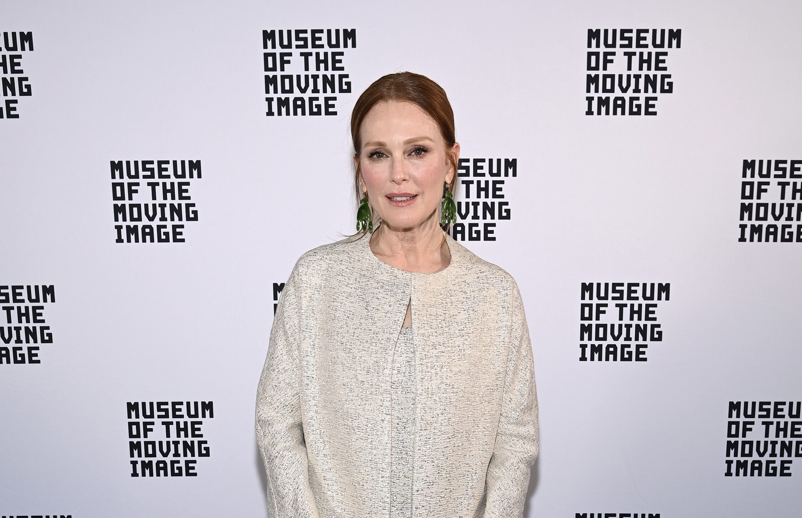 Julianne Moore at the Museum of the Moving Image event in a textured cream coat, honoring Todd Haynes in New York City.