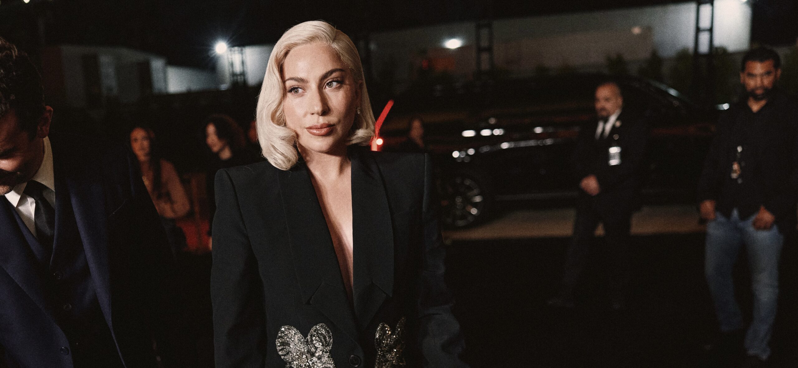 Lady Gaga at the LA special screening of Netflix's 'Maestro', dressed in a black sequined blazer, exuding Hollywood glamour.