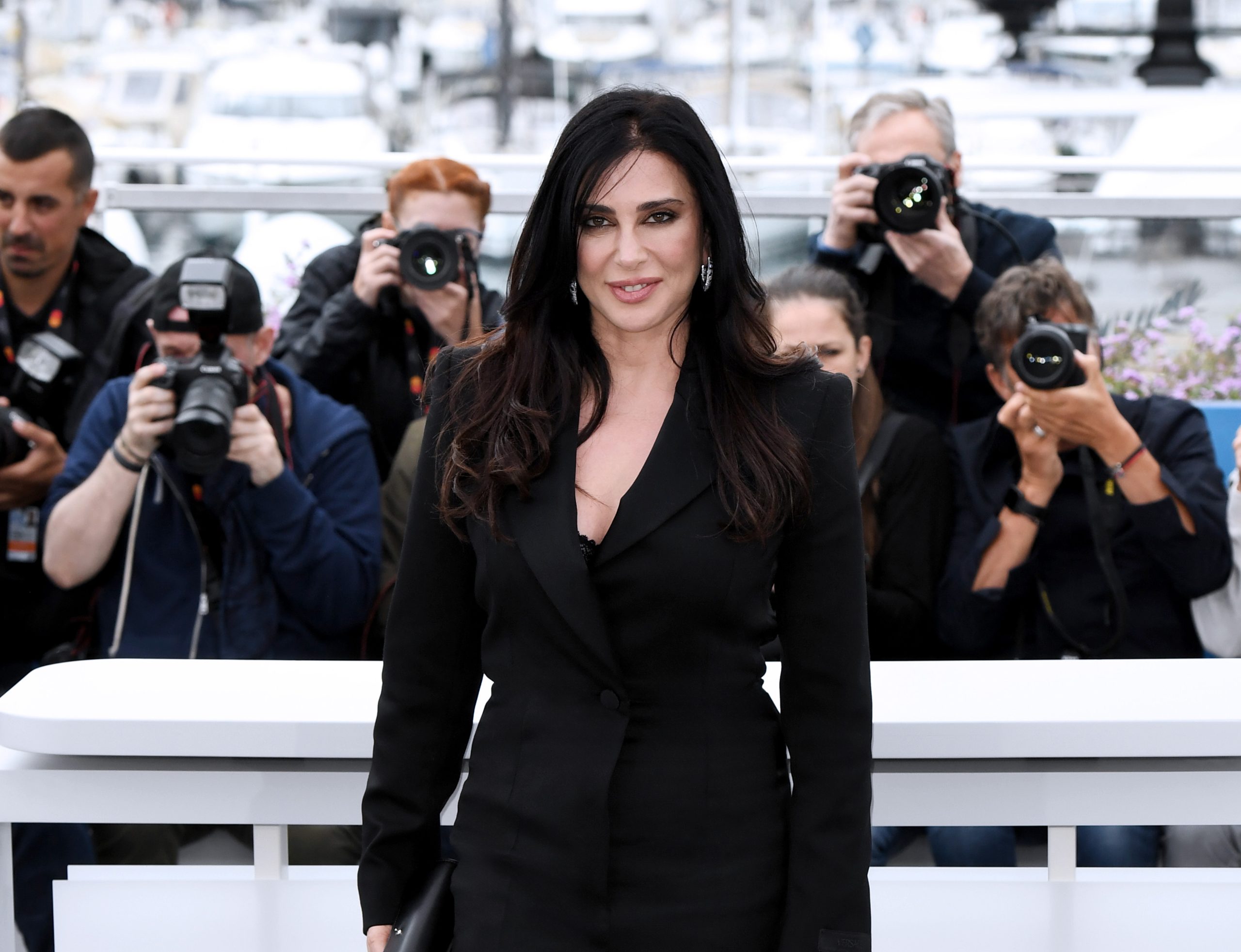 Nadine Labaki Commands Attention in Striking Versace Ensemble at Cannes 2024 Jury Photocall
