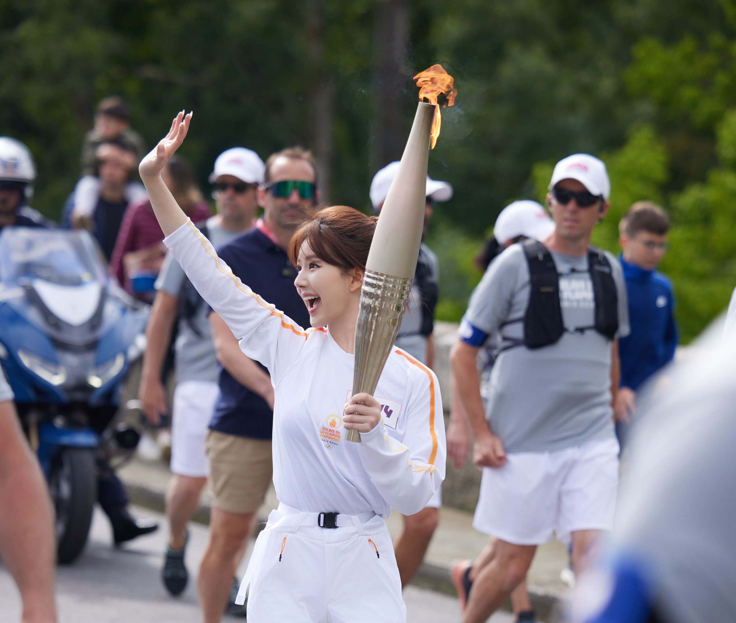 Rosy Zhao Carries the Olympic Torch in Versace, Igniting the Spirit of the 2024 Summer Olympics