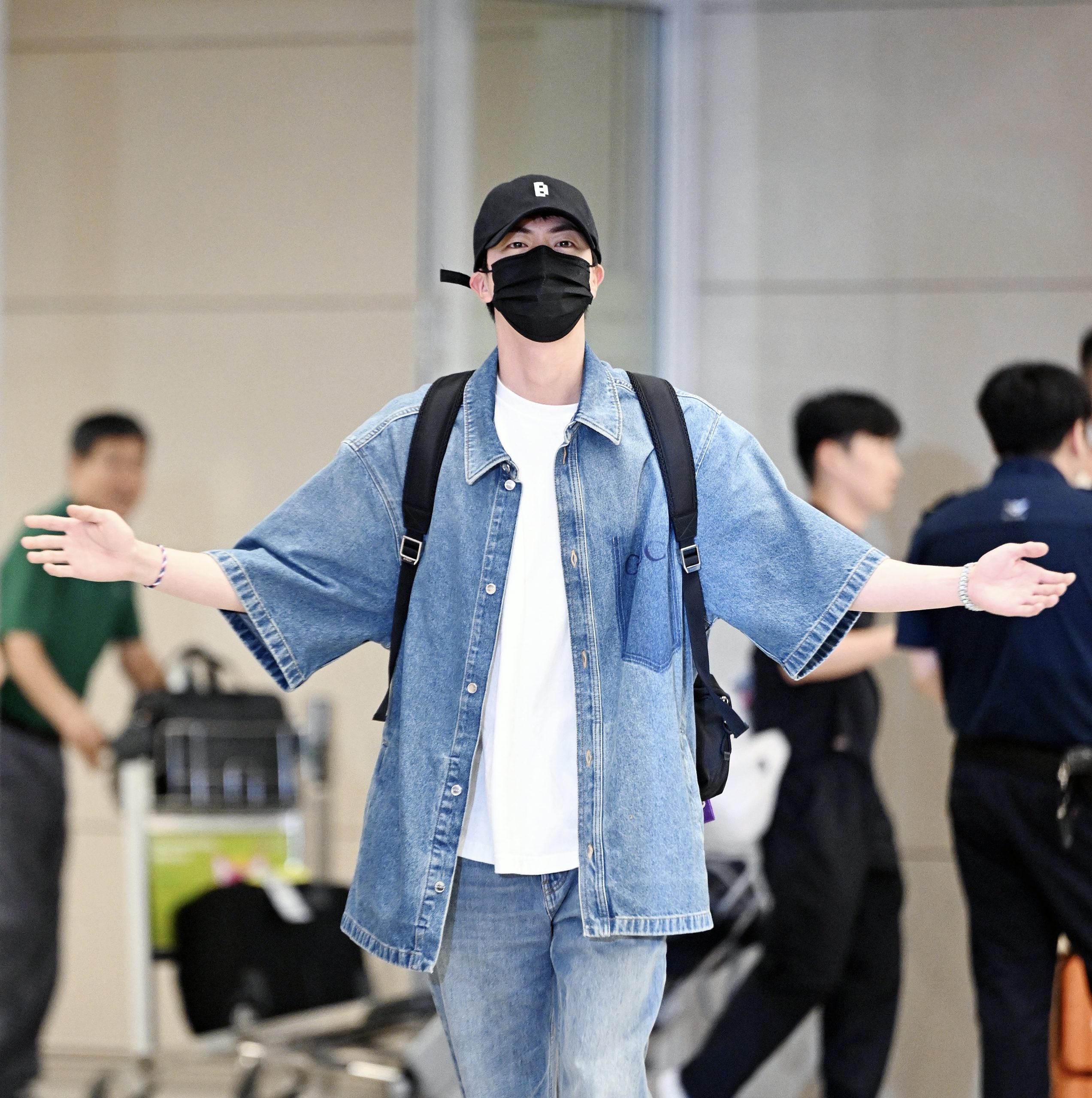 Jin of BTS Embraces Denim Airport Style in Head-to-Toe Gucci