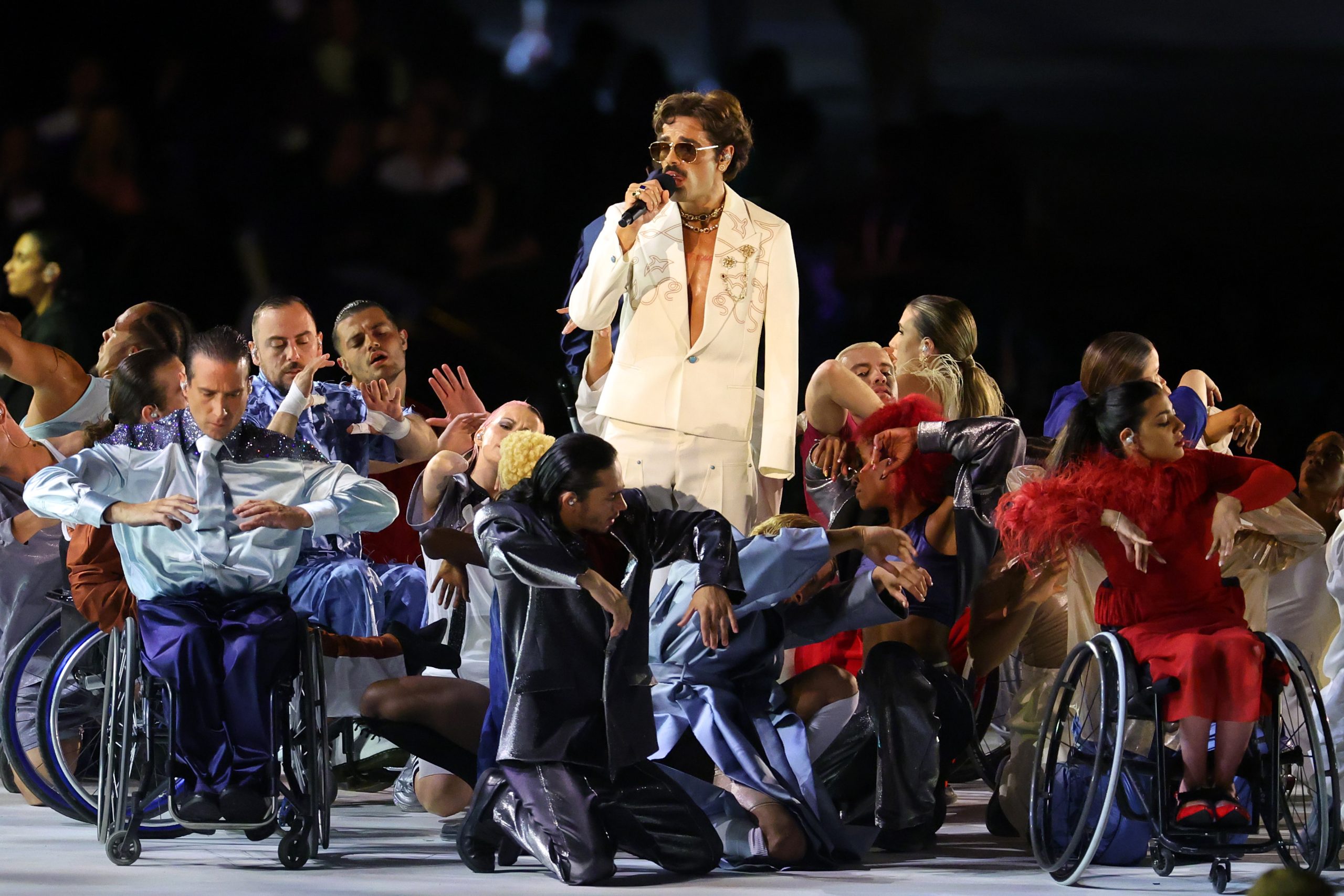 Lucky Love Dazzles in Louis Vuitton at Historic Paris 2024 Paralympic Games Opening Ceremony