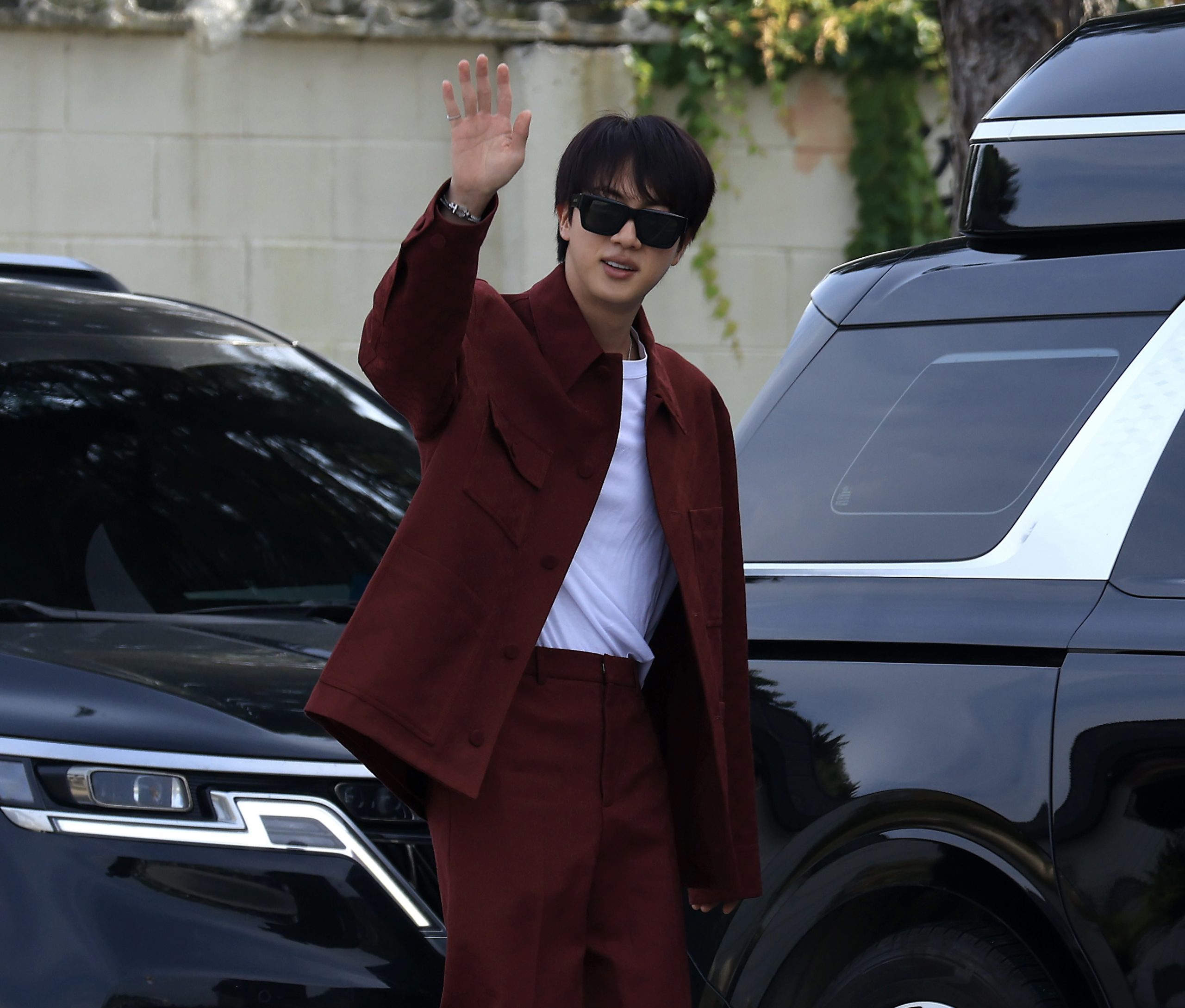 Jin of BTS Stuns in Charming Gucci Burgundy Ensemble for Fall