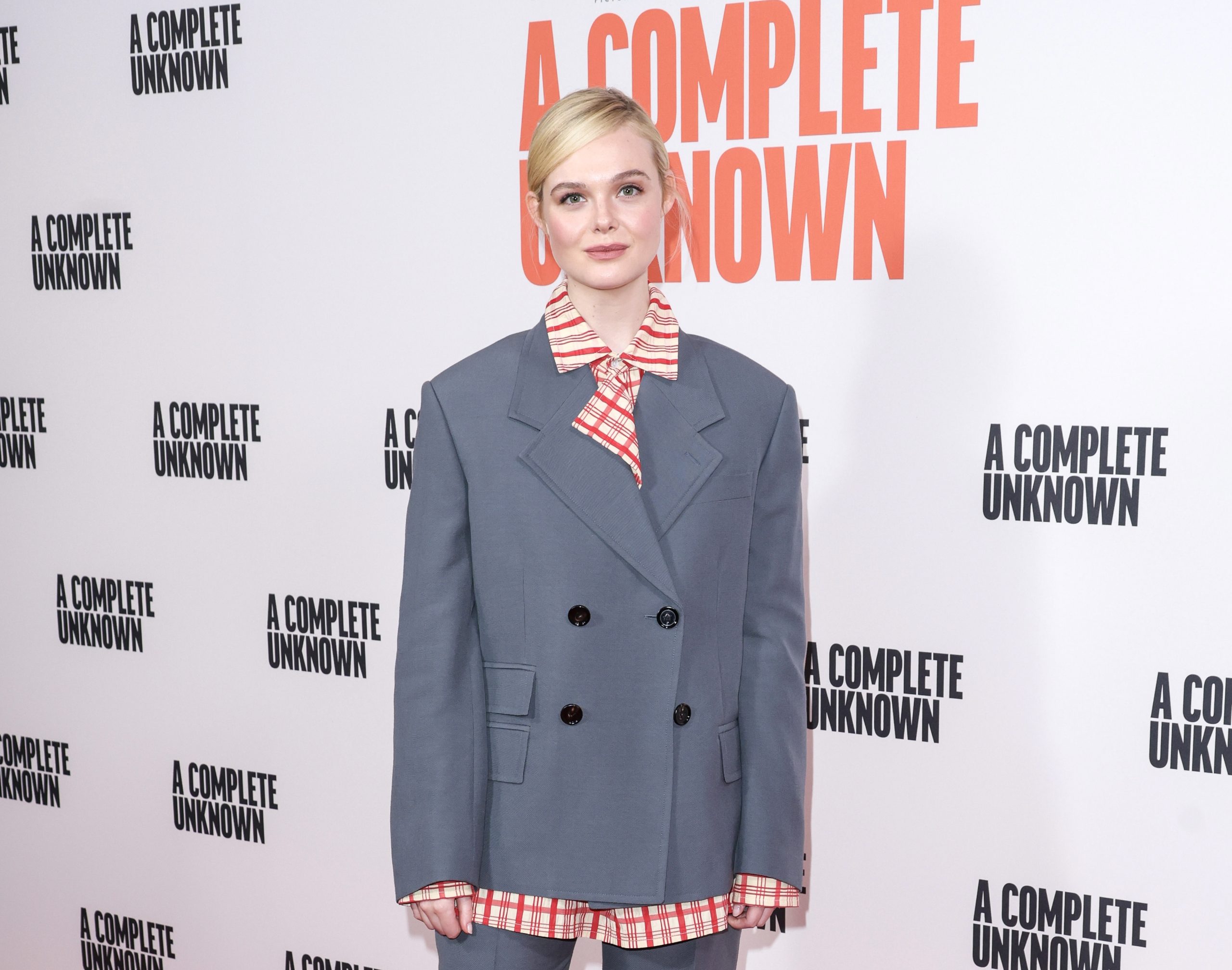 Elle Fanning Gives ‘A Complete Unknown’ a Bottega Veneta Power Suit Spin