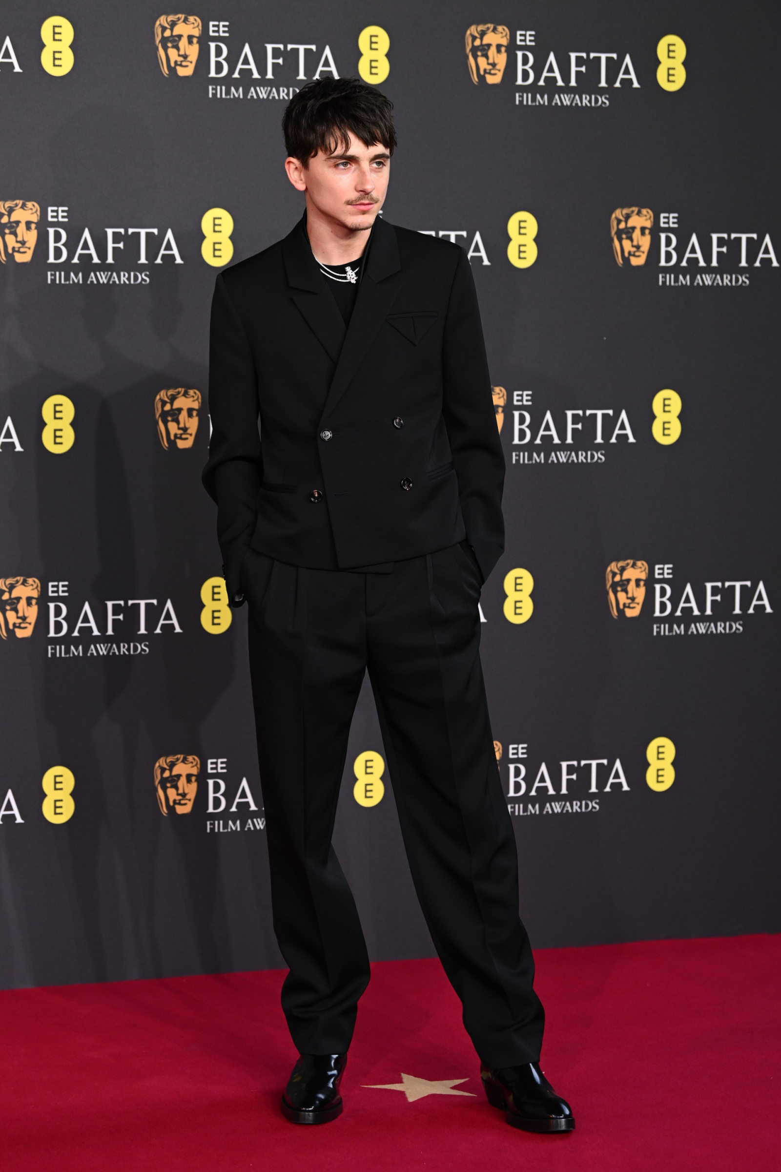 Timothée Chalamet stuns in a double-breasted suit paired with Dalton boots from Bottega Veneta at the EE BAFTA FILM AWARDS 2025 in London on February 16, 2025. (Photo: Courtesy of Bottega Veneta)