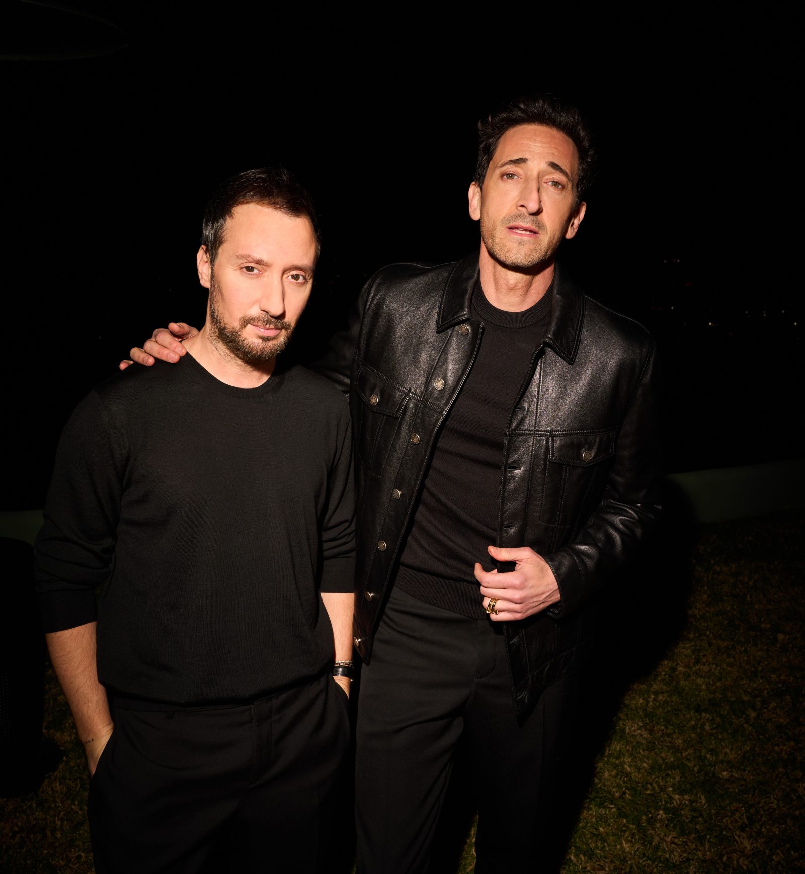 Anthony Vaccarello and Adrien Brody pose together at the Saint Laurent x Vanity Fair pre-Oscar dinner in Hollywood Hills. (Photo courtesy of Saint Laurent)