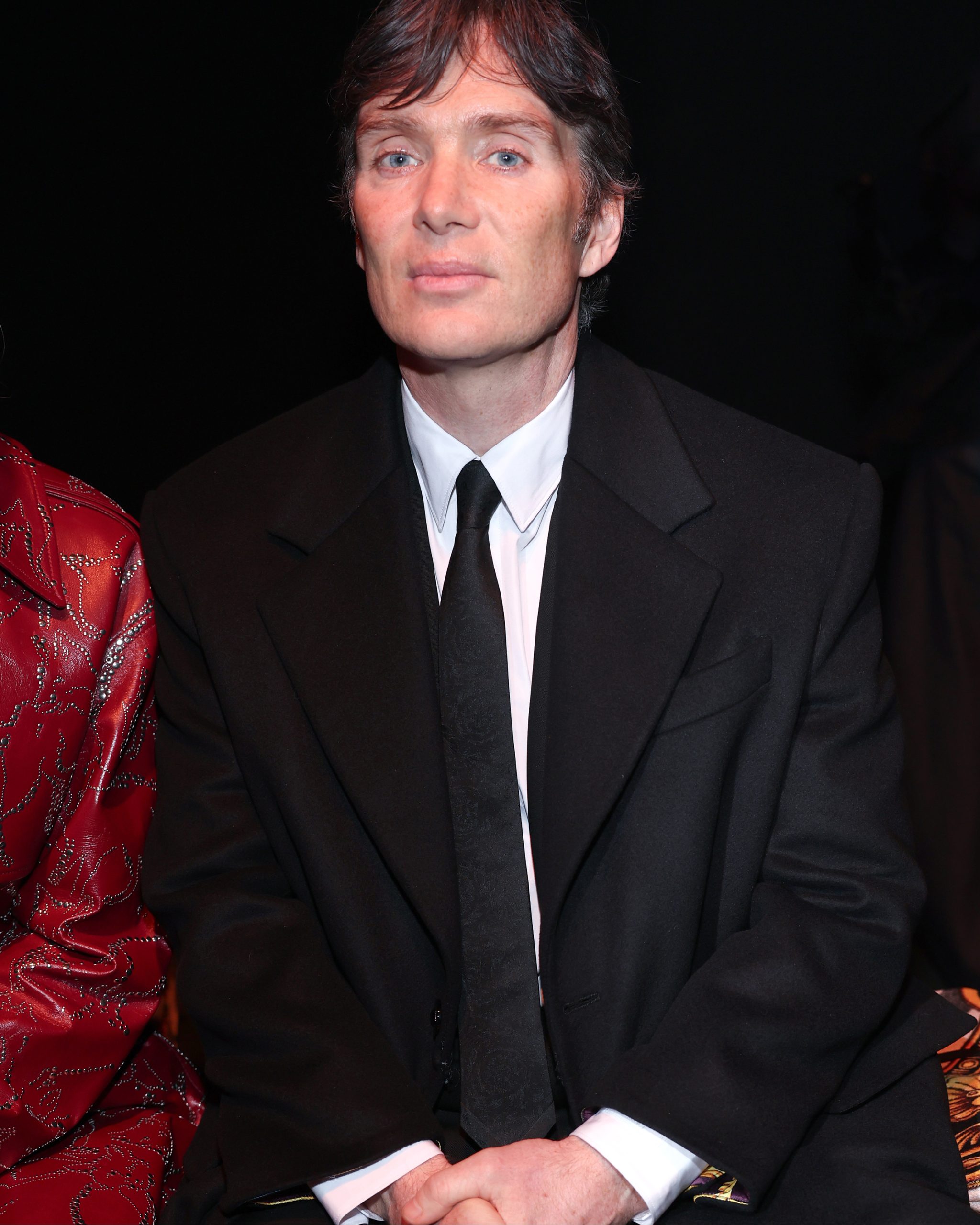 Cillian Murphy attends the Versace FW25 runway show in Milan